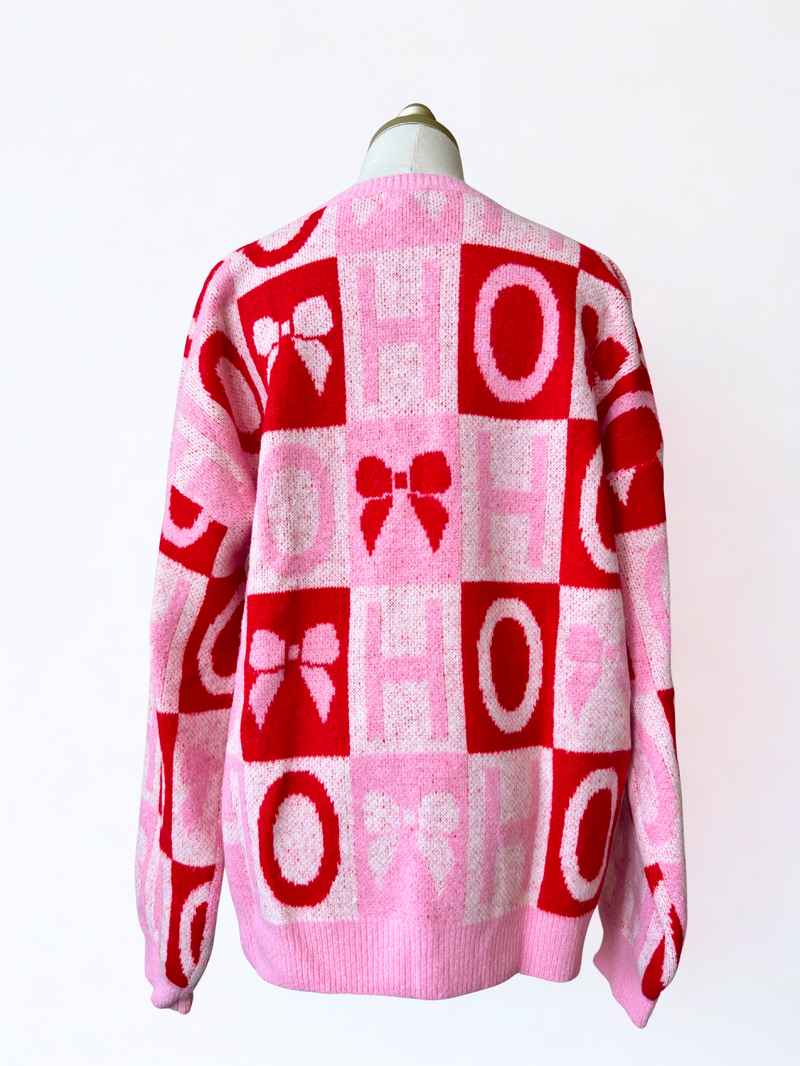 Bow and "HO" Color Block Christmas Sweater
